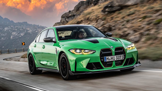 2023 BMW M3 CS driving front 3/4 green