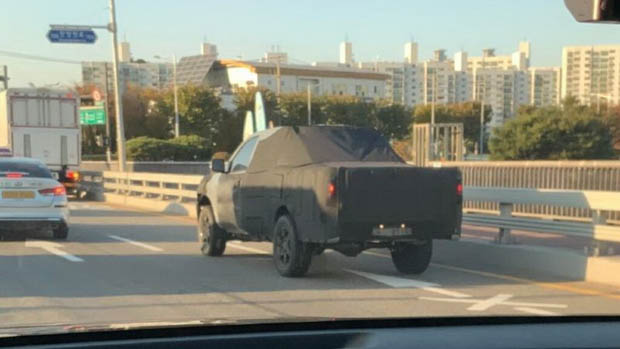 Kia ute 2023 covered up on road
