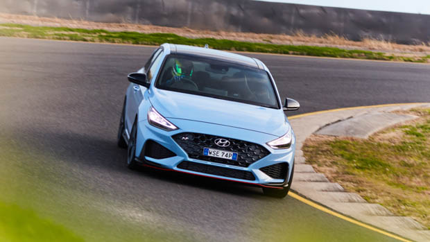 2021 Hyundai i30 N blue hatch cornering on track