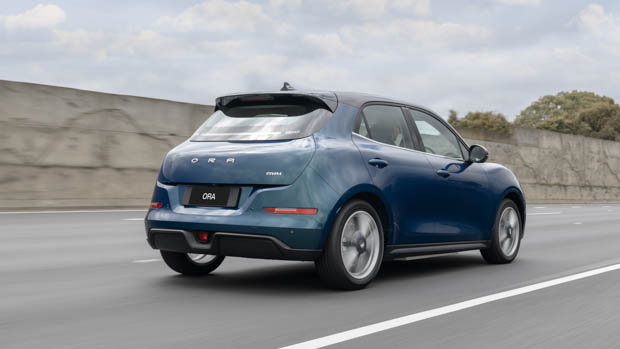 2023 GWM Ora driving on road rear 3/4