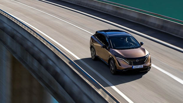 2023 Nissan Ariya driving bridge shot from above