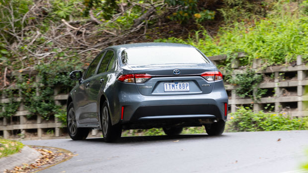Toyota Corolla Ascent Sport Hybrid rear 3/4 driving 2