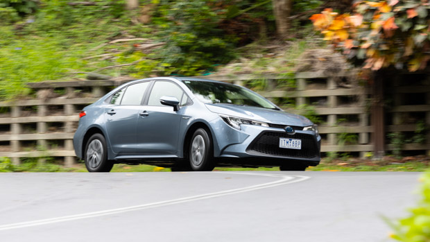 Toyota Corolla Ascent Sport Hybrid front 3/4 driving