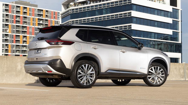 2023 Nissan X-Trail Ti-L E-Power rear 3/4 side profile buildings