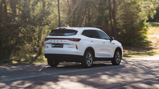 Haval H6 Ultra Hybrid 2023 driving rear 3/4 far 3