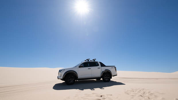 Isuzu stockton beach D-Max wide shot with sky and sun