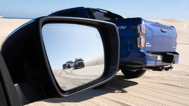 Isuzu stockton beach mirror shot with cars in background