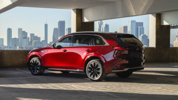 2023 Mazda CX-90 rear 3/4 static city in background