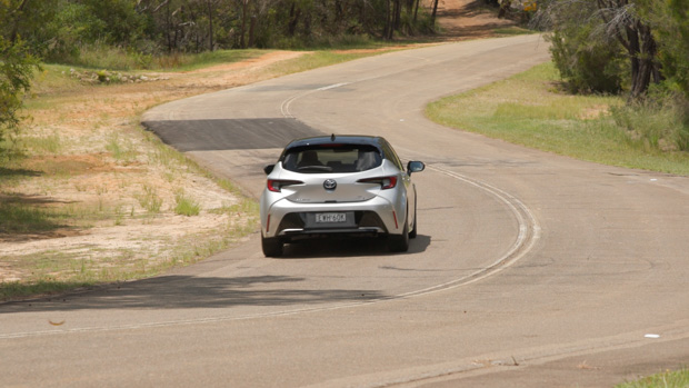 Toyota Corolla ZR Hybrid 2023 driving rear