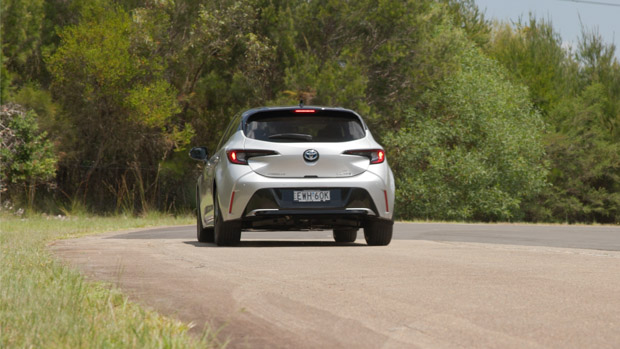 Toyota Corolla ZR Hybrid 2023 driving rear 2