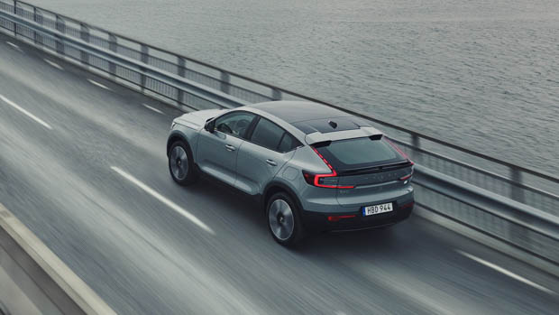 Volvo C40 Recharge driving across bridge