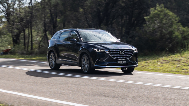 Mazda CX9 Azami LE 2023 driving front 3/4 2