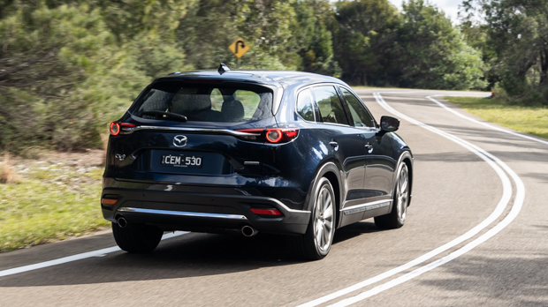 Mazda CX9 Azami LE 2023 driving rear 3/4 2