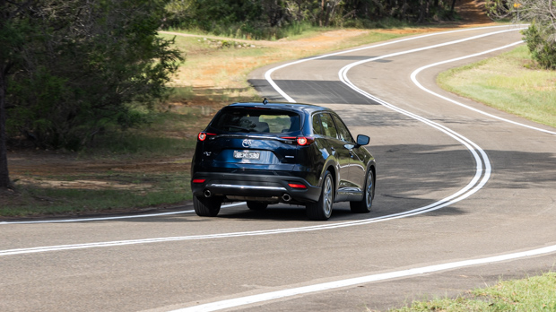 Mazda CX9 Azami LE 2023 driving rear 3/4 4