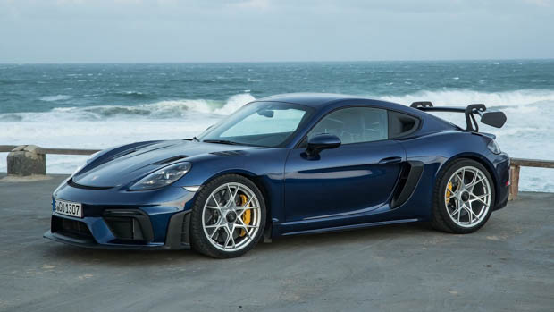 Porsche 718 Cayman GT4 RS blue by the ocean