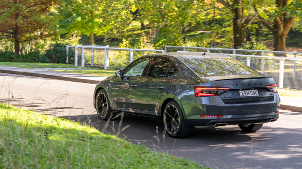 Skoda Superb 206TSI Sportline 2023 driving rear 3/4