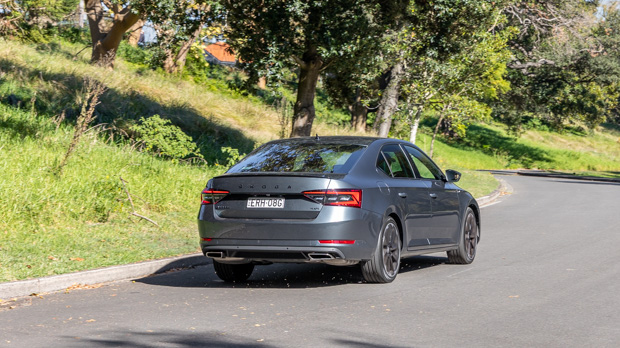 Skoda Superb 206TSI Sportline 2023 driving rear 3/4 3