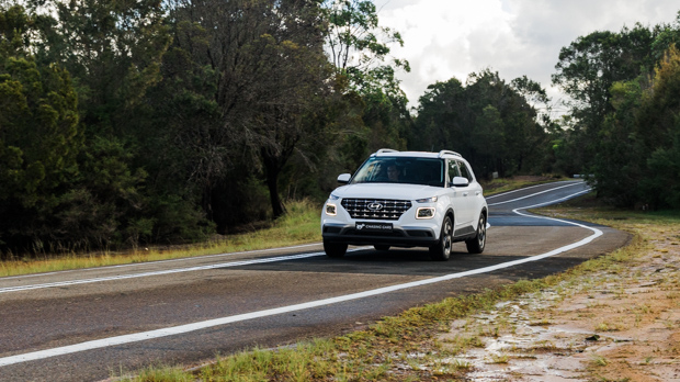 Hyundai Venue Elite 2023 driving front 3/4 far 3