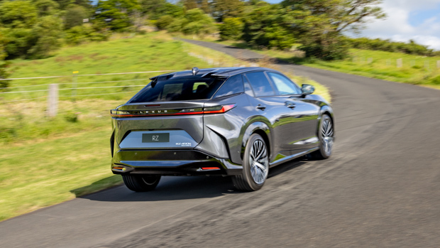 Lexus RZ 450e Sports Luxury 2023 driving rear 3/4 2