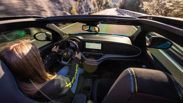 2023 Abarth 500e Turismo blue interior driving shot