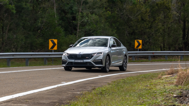 Skoda Octavia RS 2023 driving front 3/4 far 3
