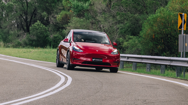 2023 Tesla Model Y Performance red cornering