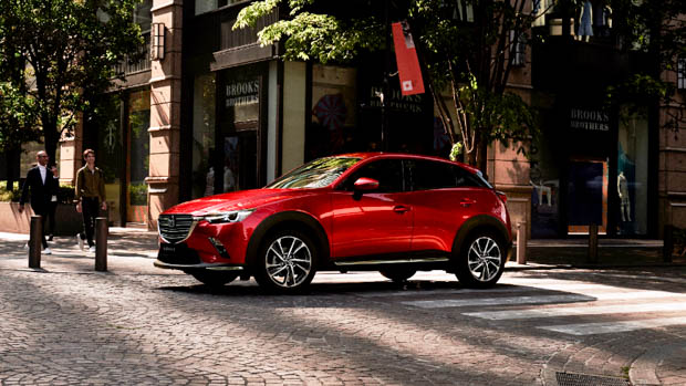 2023 Mazda CX-3 G20 Akari red side angle wide