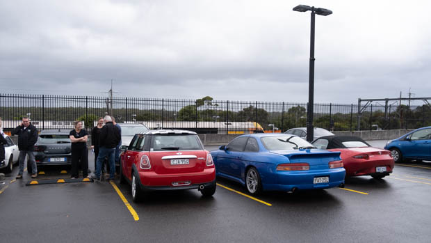 Drive Against Depression standing around cars at meet