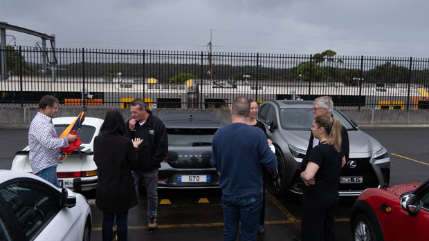 Drive Against Depression standing having a chat with the group