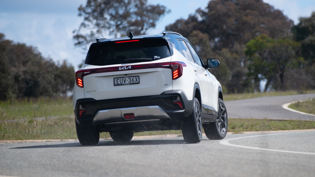 Kia Seltos small SUV megatest 2022 rear 3/4 driving