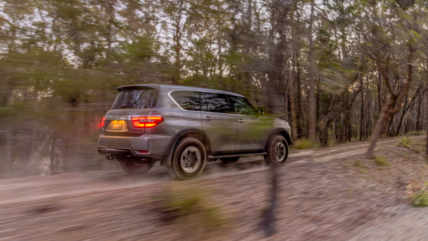 Nissan Patrol Warrior 2023 driving off road rear