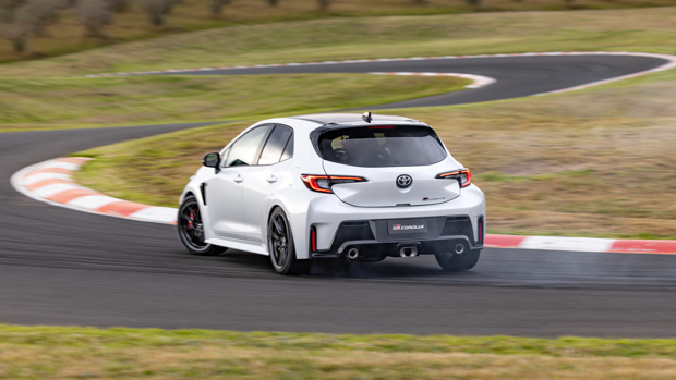 Toyota GR Corolla Morizo Edition 2023 driving rear 3/4