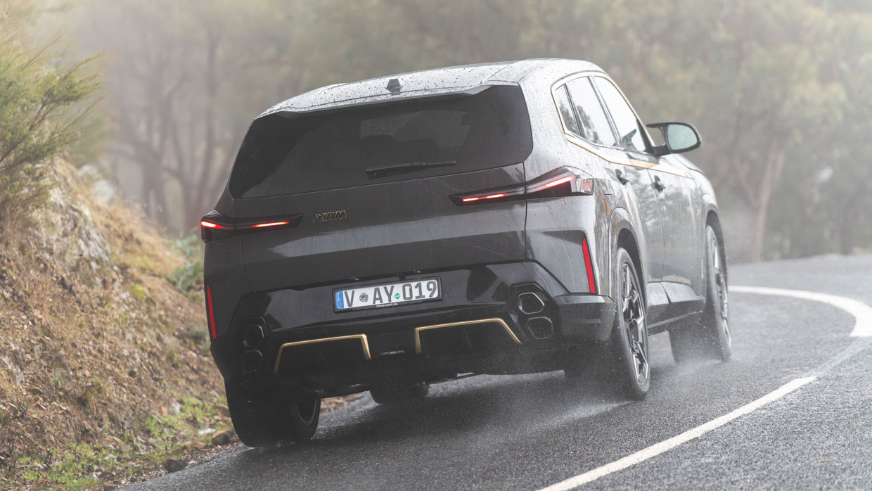 BMW XM 2023 driving hills rear