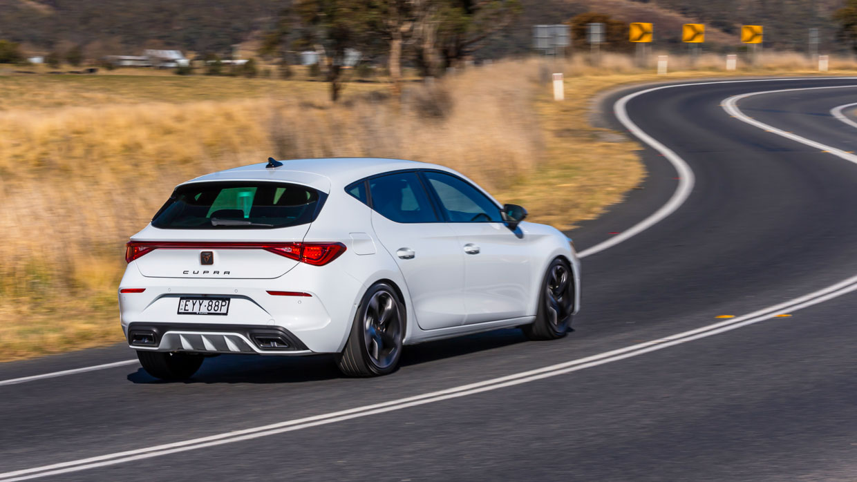 Cupra Leon V 2023 driving rear 3/4 2