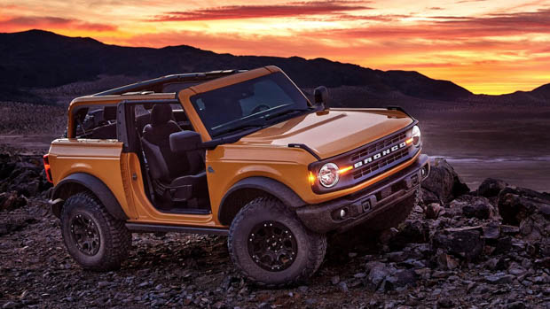 Ford Bronco 2 door orange side angle sunset