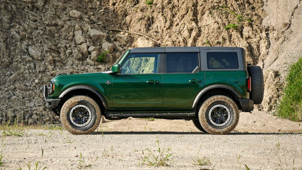 Ford Bronco 4 door inexperienced aspect profile static shot