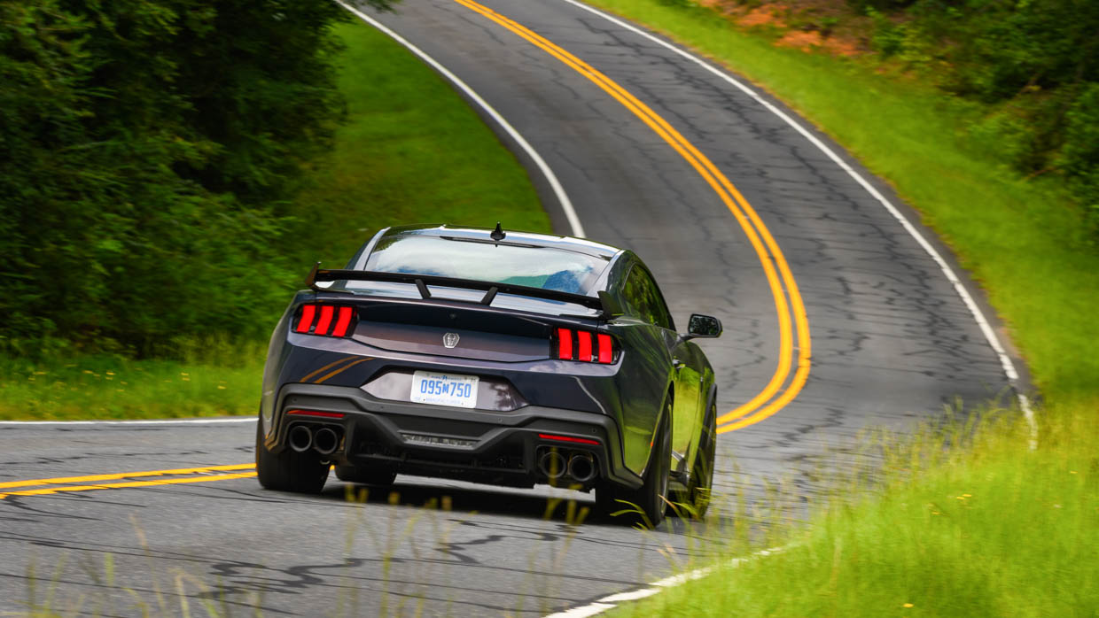Ford Mustang Dark Horse 2024 driving rear close