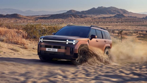 2024 Hyundai Santa Fe front 3/4 driving in sand