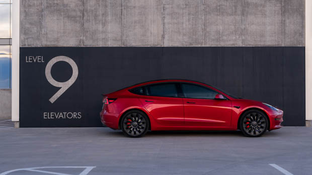 2023 Tesla Model 3 red side profile