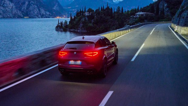 2023 Alfa Romeo Stelvio QV on the road night rear angle