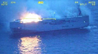 Ship carrying almost 3,000 vehicles on fire, electric car the likely cause