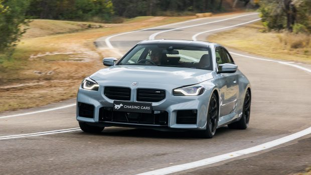BMW M2 2023 driving front 3/4 close
