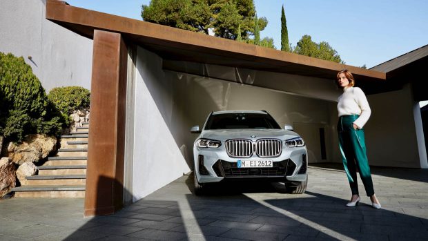 2023 BMW X3 xDrive30i Sport Collection front angle with model