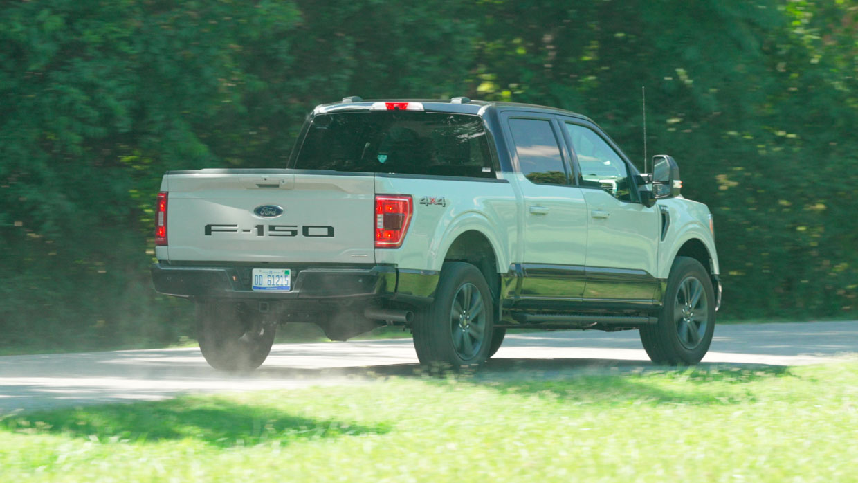 Ford F-150 XLT Heritage Edition 2023 driving rear