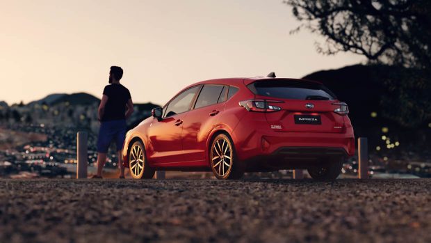 2024 Subaru Impreza rear 3/4 red shot