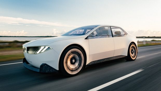 BMW Vision Neue Klasse 2024 white driving front three quarter