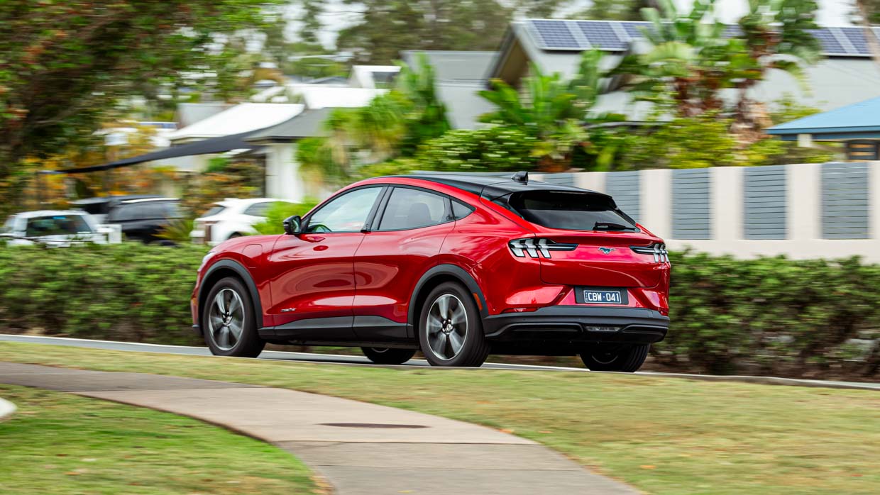 Ford Mustang Mach-E Select 2023 rear far driving