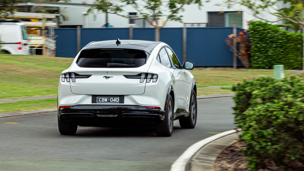 Ford Mustang Mach-E Premium 2023 driving rear city 2