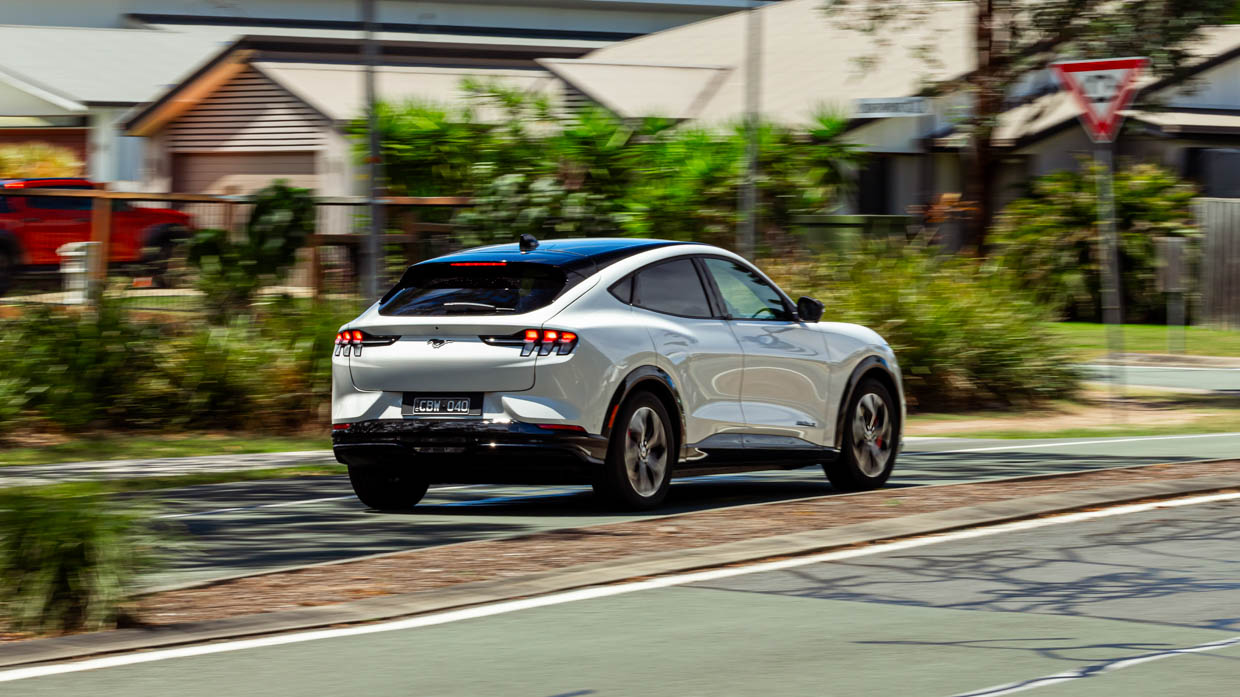 Ford Mustang Mach-E Premium 2023 driving rear city