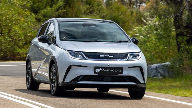 BYD Dolphin Premium 2023 driving front 3/4 2